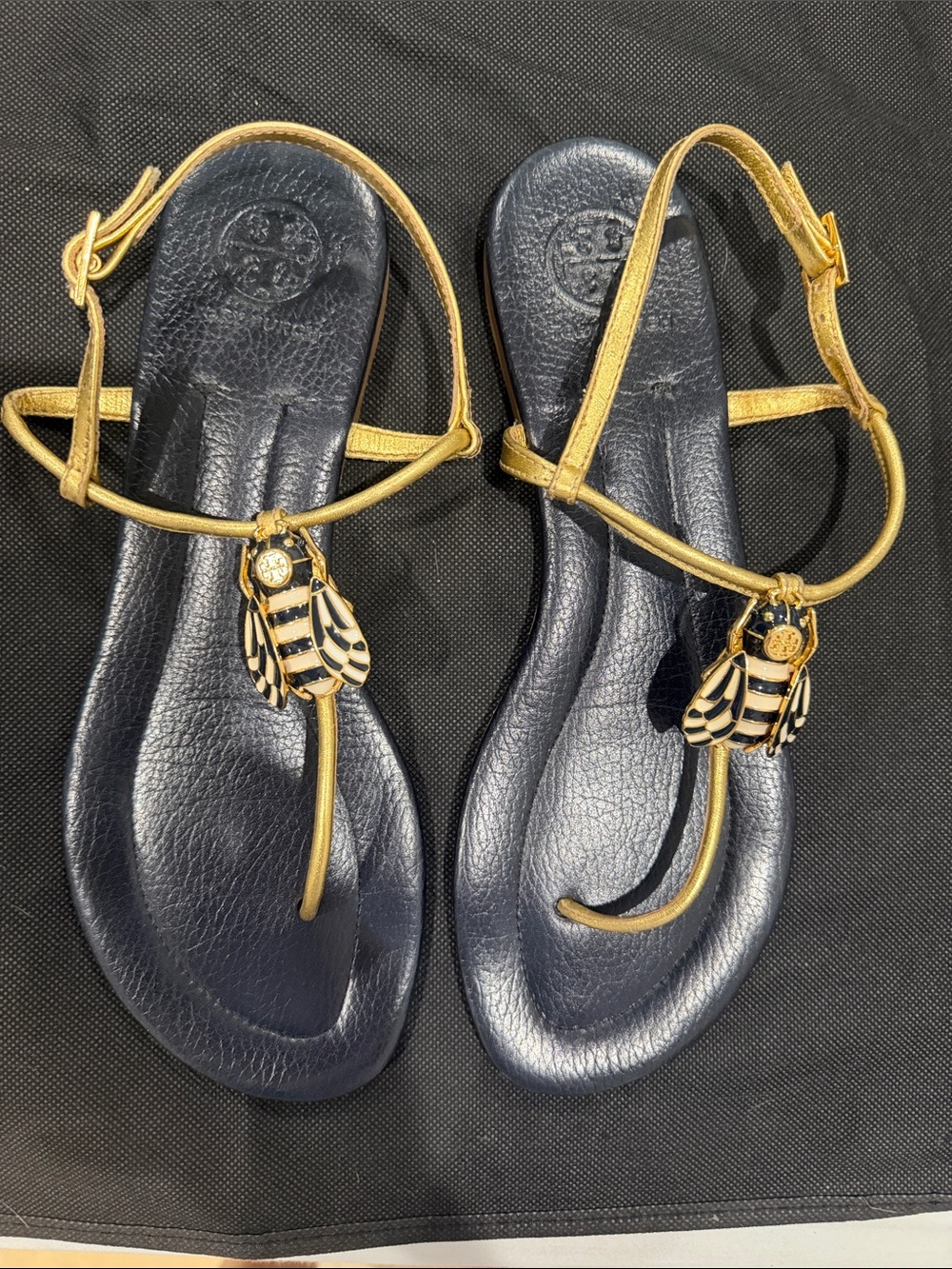 Tory Burch Navy Leather Sandals with Gold Straps and Logo Charms